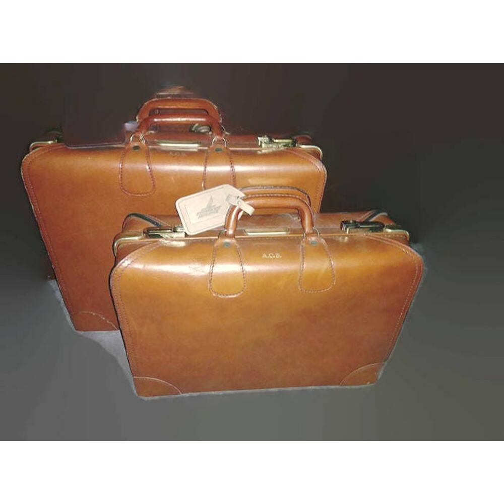 Pair suitcases cow hide leather by Diamond Leathercraft